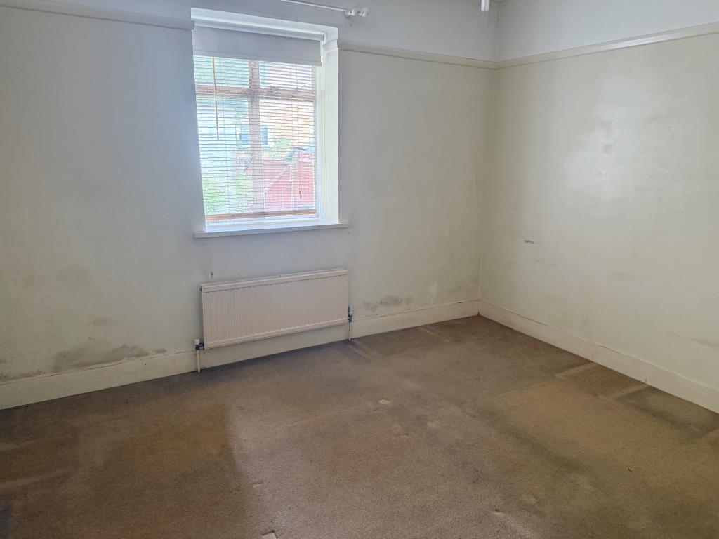 Lot: 19 - FREEHOLD GROUND RENTS WITH VACANT FLAT AND GARAGE - Second bedroom with window to rear